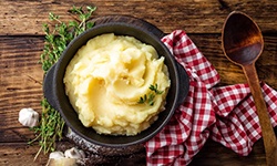 a bowl of mashed potatoes for dental implant diet