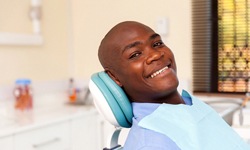 man smiling and going through osseointegration for implants in Leesburg