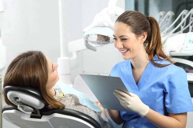 patient asking dentist questions before getting smile makeover