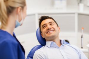 Man asking his dentist questions